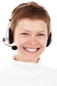 smiling-phone-operator free stock photo